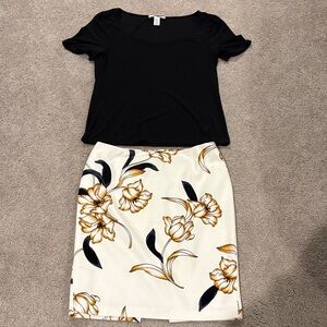 White House Black Market Floral Skirt. Size 2. Black short sleeve boat neck top.